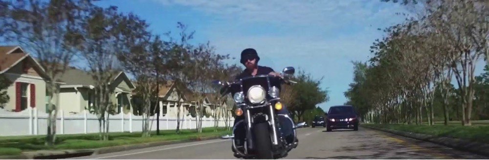 A rider on a suburban road, from the HURT911 film